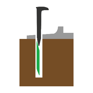 SpikePlug and railroad spike seated together in a tie